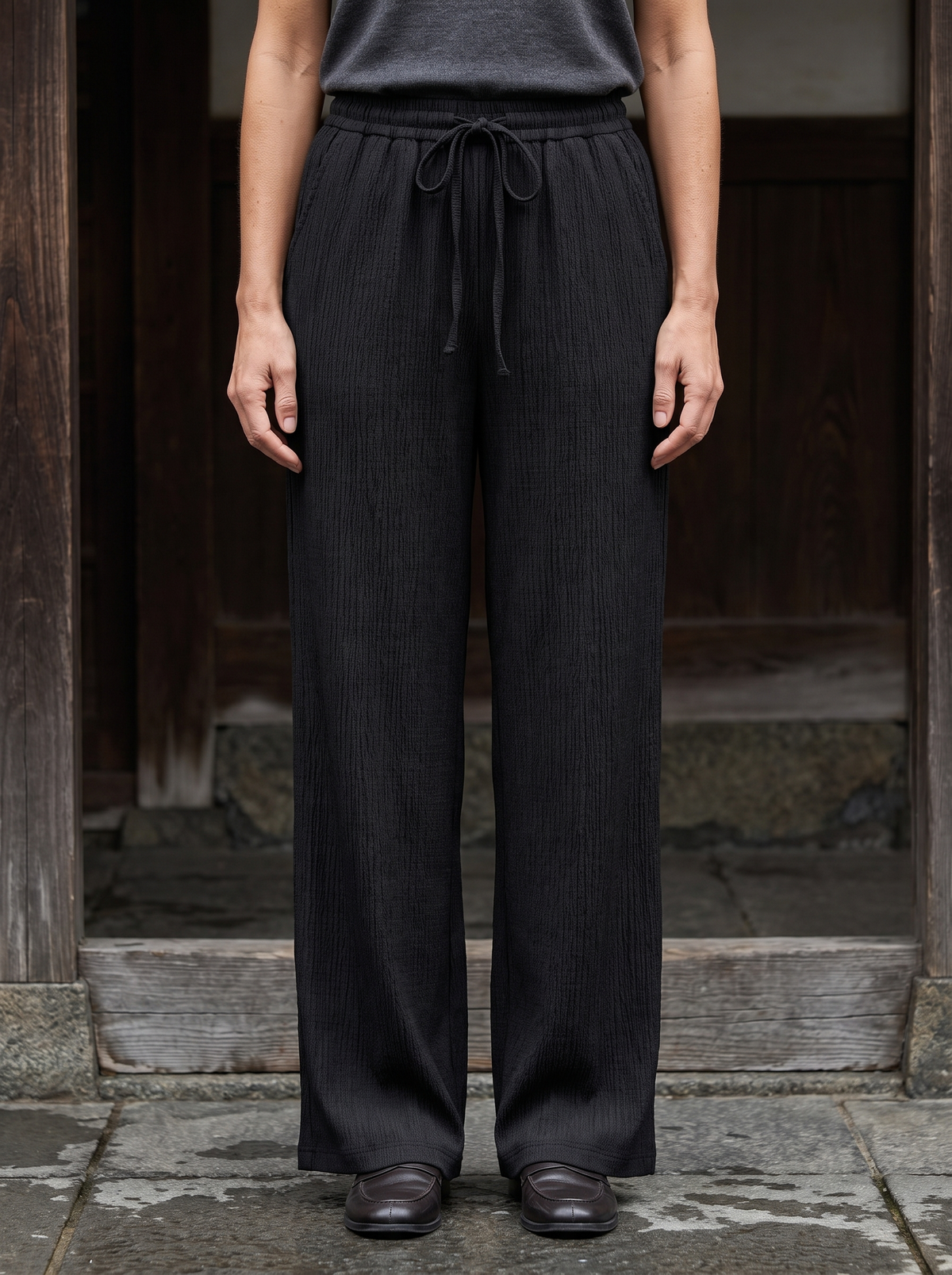 Margot Drawstring Wide-Leg Pants in Black - front view