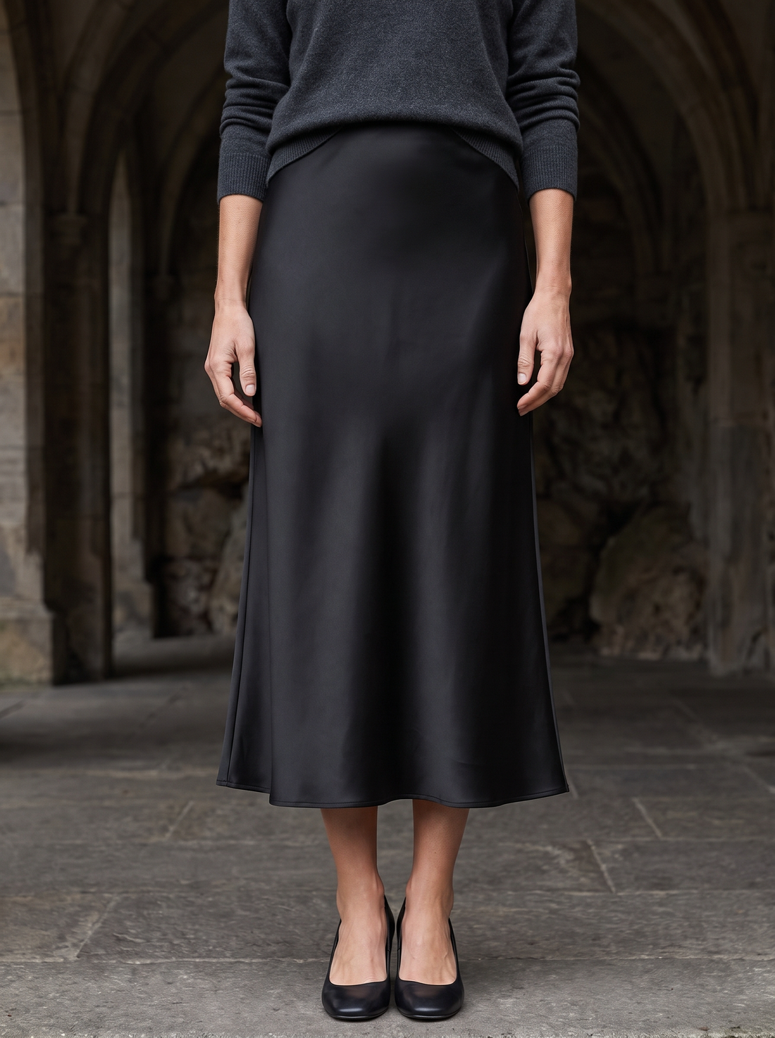 Sylvie Satin Midi Skirt in Black - front view